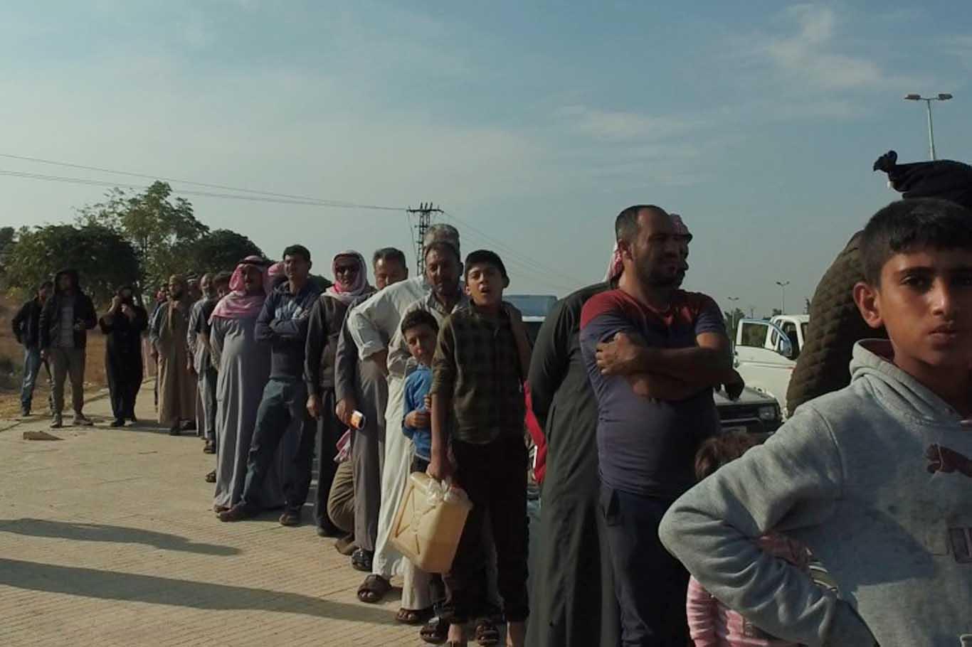 Tel Abyad halkına yardım dağıtıldı Tel Abyad halkına yardım dağıtıldı